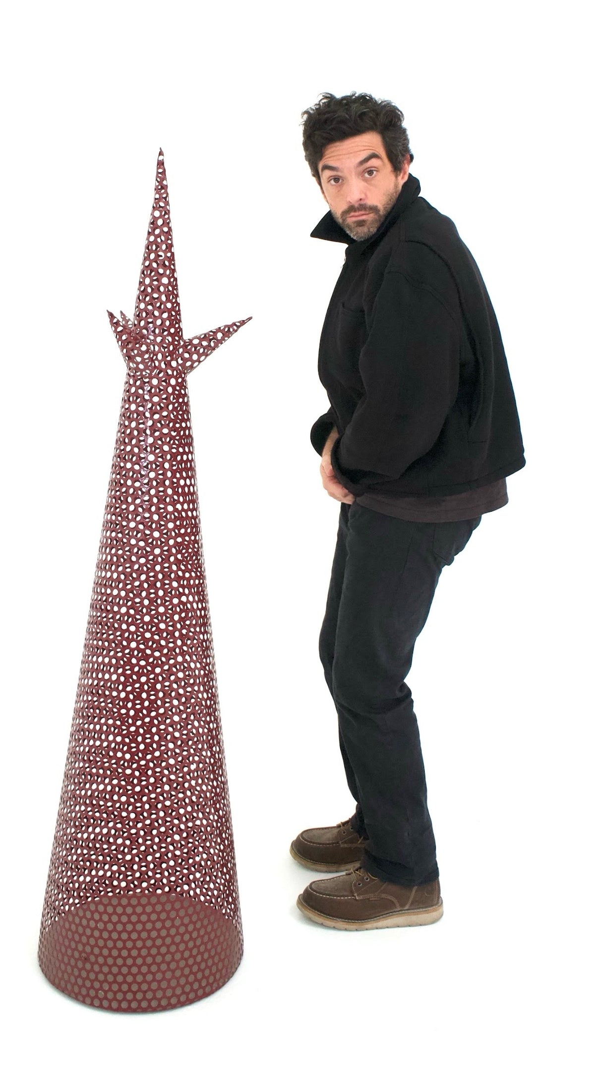 The Perf shown next to a person for scale
